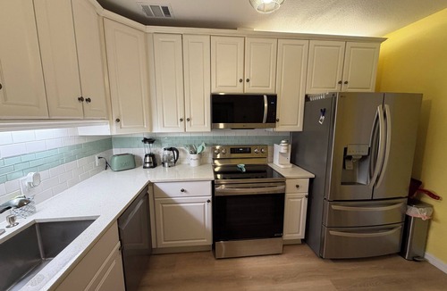 Indian Shores House | Private Newly remodeled Beach Bungalow - steps to Ocean, Pet-friendly, family.