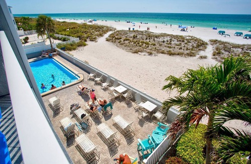 Treasure Island Condo | Relax on Your Private Beachfront Balcony! Pool, Beach, Tiki Bar, Grills, +Tickets to Fun Activities!