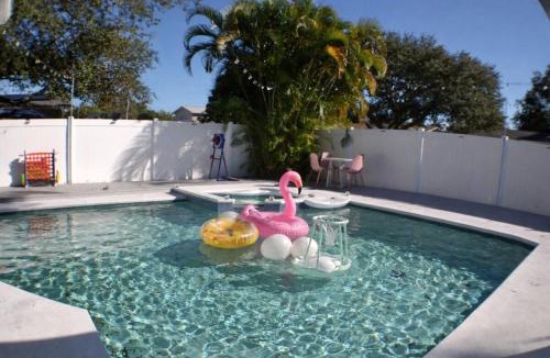 Largo House | Resort Backyard Heated Pool Spa Arcade Movies