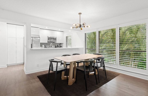 Hunt Club Apartment | Restoration Hardware PGA National Condo w/180° Golf Course Views