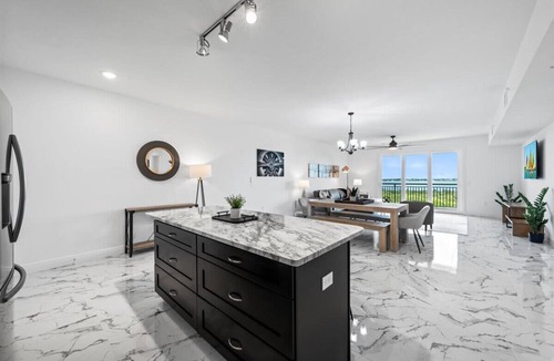 Merritt Island Condo | RIVER FLY IN: Coastal Penthouse, Panoramic Views