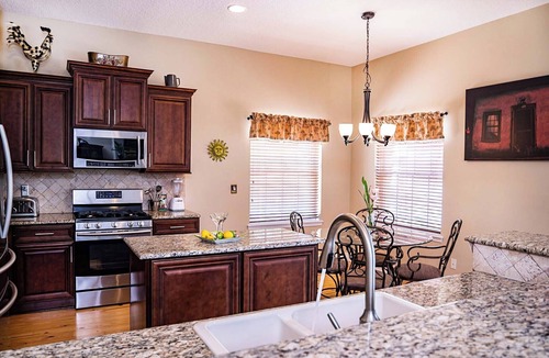 Vilano Beach House | Salt water pool - jacuzzi - BBQ - walk to beach - large screened lanai