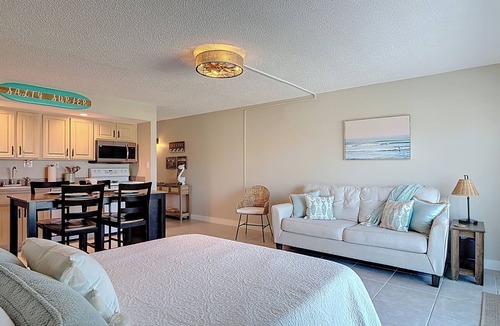 Coronado Cove Apartment | Salty Surfer Beach Getaway studio in New Smyrna Beach