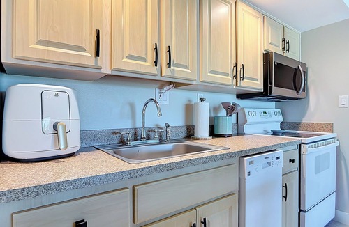 Coronado Cove Apartment | Salty Surfer Beach Getaway studio in New Smyrna Beach