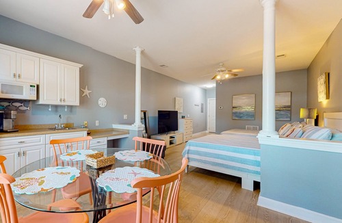 Sea Trail Apartment | SB72B: Coastal Suite with golf course view and shared pool access
