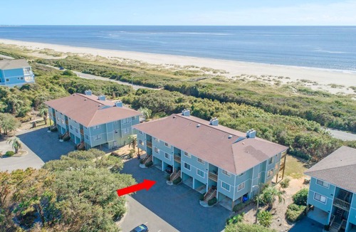 Caswell Beach Condo | Secluded private OceanFront 3BR Condo steps from the pool golf course and ocean!