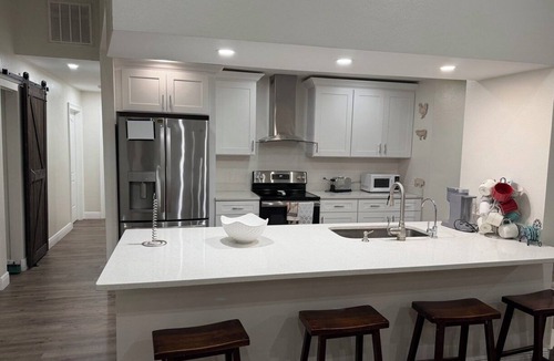 Port Richey House | Spacious 4-bedroom farmhouse in tranquil New Port Richey with AC