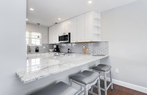 Southend House | Spacious Beach Contemporary Townhome with pool and bicycles