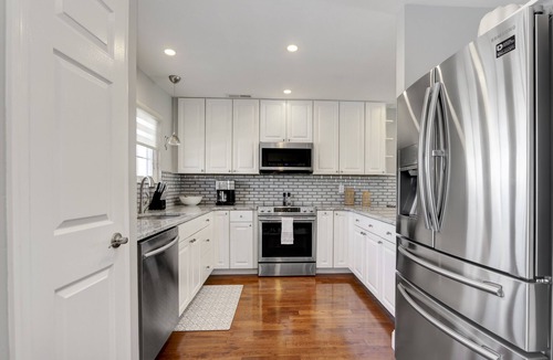 Southend House | Spacious Beach Contemporary Townhome with pool and bicycles