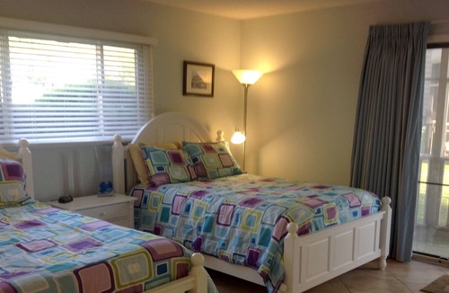 Sea Trail Condo | Spacious, First Floor Corner Unit, brings outdoors in w/ magnificent pond view!