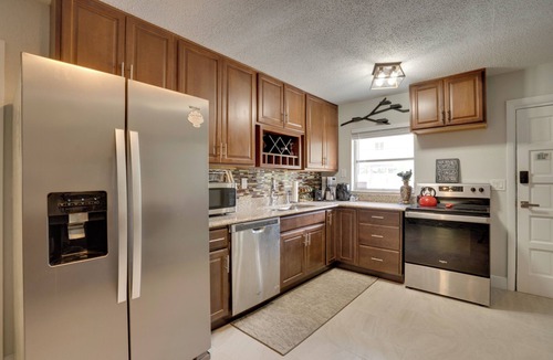 Redington Shores Cottage | Steps to Gulf: Updated Duplex in Redington Shores!
