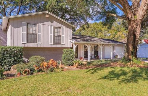 Temple Terrace House | Stunning Home w Heated Saltwater Pool & Pond View