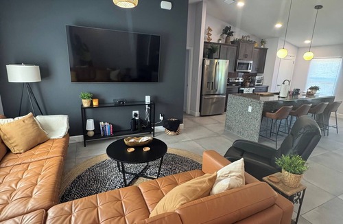 Palm Coast House | Stylish Palm Coast Home w/BRAND NEW Private Heated Pool & Tropical Haven!