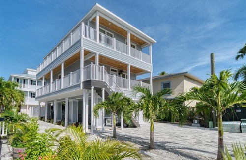 Independence Square House | Sunbelt Beach House—Key West-Style Pool Home w/Game Garage, Gulf Glimpses & Walk-to-Beach Access