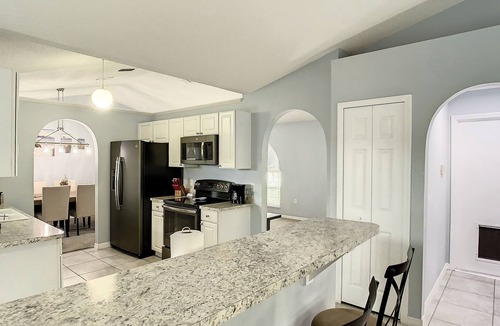 Sunridge Woods Villa | Sunridge Siesta | Beautiful pond facing pool home