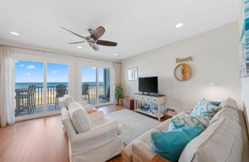 Carolina Beach Apartment | Surf Break - Feel your stress melt away as you relax on the ocean view deck and listen to the waves crash condo