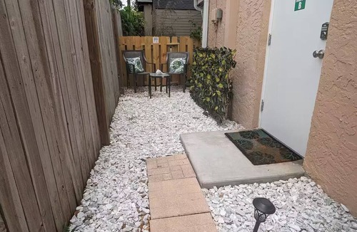 Seminole Apartment | The Florida Room, Private entry, driveway parking, fenced outside seating area