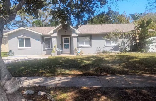 Seminole Apartment | The Florida Room, Private entry, driveway parking, fenced outside seating area