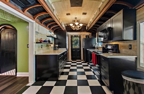 New Smyrna Beach House | The TRAIN House 3/2 w/HOTTUB, WiFi, In delightful New Smyrna deck, grill,dogs ok