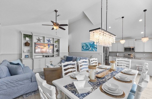 Holmes Beach House | Tiki By The Sea by Duncan Real Estate