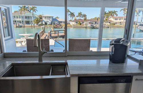 Capri Isle House | Treasure Island Beach Waterfront Pool and Dock Home