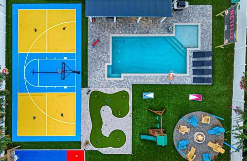 Largo House | Tropical boho villa w pool & game court