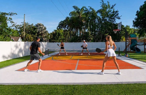 Clearwater House | Tropical getaway w Pool, Pickleball & Game Room