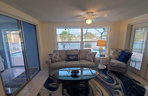 Jasmine Lakes House | Tropical Waterfront HEATED Pool/SPA Home by 9 BEACHES & 9 STATE PARKS SLEEPS 11