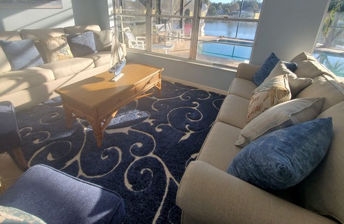 Jasmine Lakes House | Tropical Waterfront HEATED Pool/SPA Home by 9 BEACHES & 9 STATE PARKS SLEEPS 11