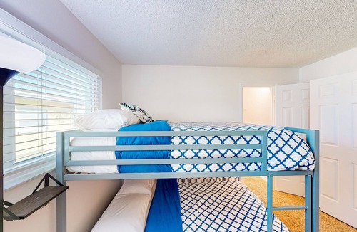 Capri Isle House | Two-story waterfront retreat with dock, pool, central AC, fireplace, & fast WiFi