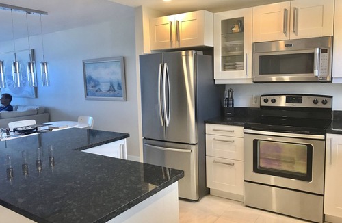 Sand Key Condo | Unit 502 2 waterfront balconies! Expansive white sand beach Harbor Light Tower
