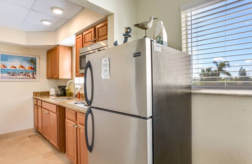 Belleair Beach Condo | Updated! On the Beach! Pets Allowed, Pool, Parking, Free Activities! ~ 201 Bellair Beach Club