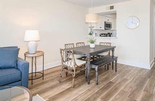 Caswell Beach Condo | Updated third-floor condo with WiFi, shared pool, balcony, W/D, & central AC