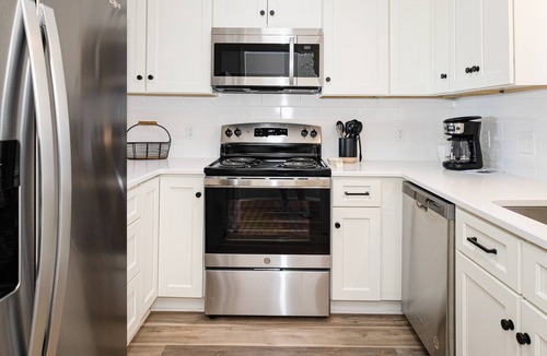 Caswell Beach Condo | Updated third-floor condo with WiFi, shared pool, balcony, W/D, & central AC
