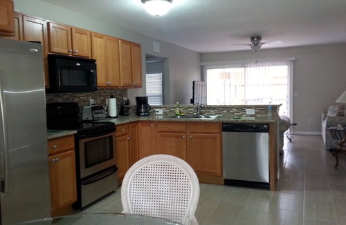 Gulf Gate Estates Condo | Vacation Rental Sarasota 2BR/1BA Condo Heated Pool, wi-fi lake view, backyard