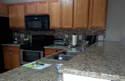 Gulf Gate Estates Condo | Vacation Rental Sarasota 2BR/1BA Condo Heated Pool, wi-fi lake view, backyard