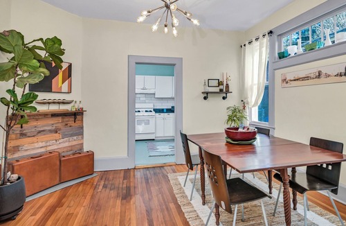 Eau Claire House | Walk or bike to Noma or Main Street district from this fun & peaceful retreat.