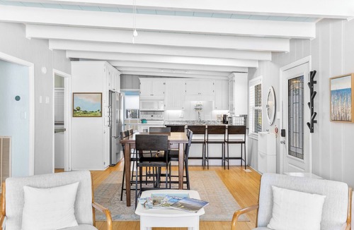 Yaupon Beach House | Walk to beach access - hot tub, dog friendly, sleeps 9!