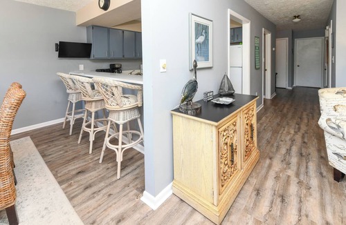 Surfside Beach Condo | Walk to the beach 2 BR Condo with Shared Pool! Sea Grove 106