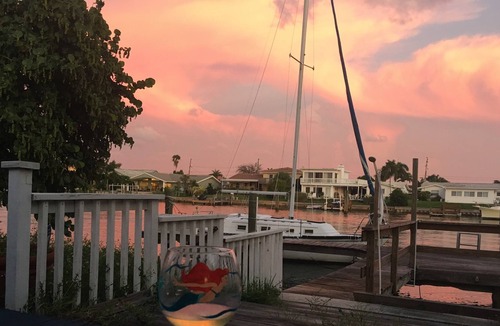 Capri Isle House | Watch sunsets from waterfront deck of 3,000 sq-ft. home in Tampa Bay beach town!