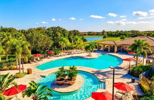 Braden River House | Water view golf resort 3B pool house near shops 30 mins to beach pet ok