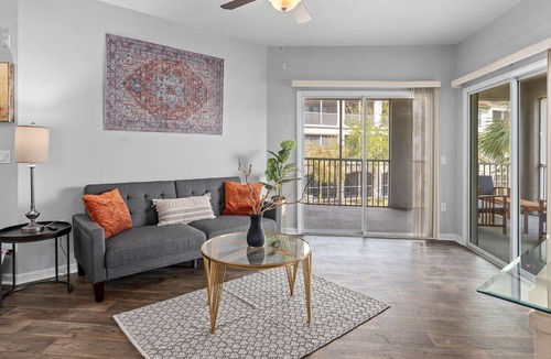 Ocoee Apartment | Water-View Oasis w/spacious wrap around screened in balcony- mins from beach