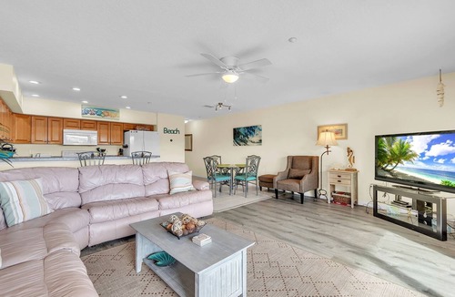 Indian Shores Condo | 🐬Water Views🐶Dogs Welcome🌞Walk to Beach🌴Heated Pool/Fishing Dock