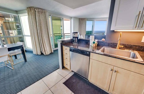 Downtown Myrtle Beach Condo | Waterfront condo with pool & hot tub