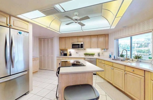 Sorrento Shores House | Waterfront home with pool dock accessible to Gulf dog friendly with AC & WD