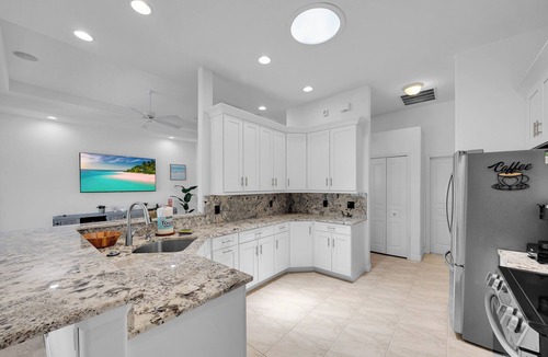 Palm Harbor House | Waterfront Retreat with Private Pool, Dock, Firepit & Kayaks