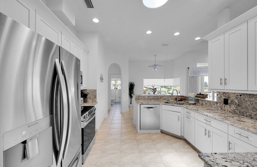 Palm Harbor House | Waterfront Retreat with Private Pool, Dock, Firepit & Kayaks