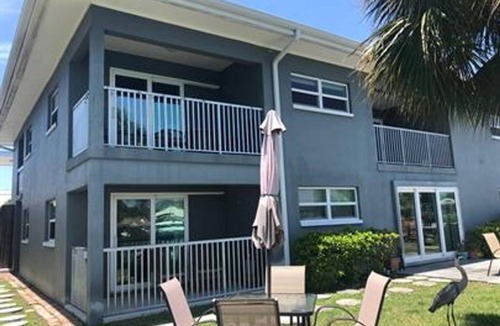 Capri Isle Apartment | Waterfront Treasure Island Apartment w/Private Patio, Dock & John’s Pass Nearby