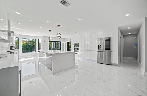 Ludlam Resort | You'll be captivated by the stunning 28 x 40 custom heated pool with jacuzzi