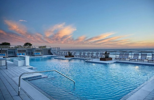 East Daytona Hotel | Your Relaxing Getaway Awaits! Beachfront Location, Outdoor Pool, Pet-friendly!